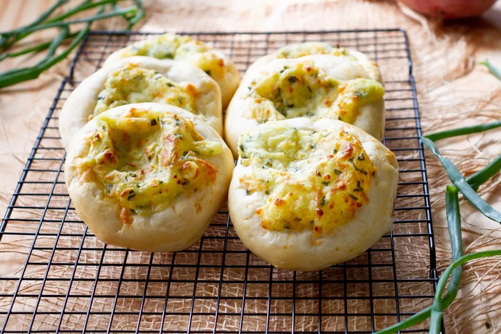 Savoury buns with cheese and potato filling