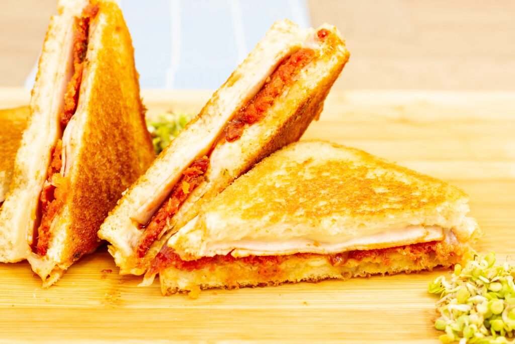 Recipe for toasts with cheese, ham and pepperoni