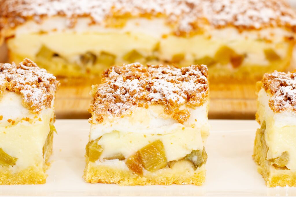 Homemade shortcrust pastry topped with tangy rhubarb, creamy custard and golden meringue