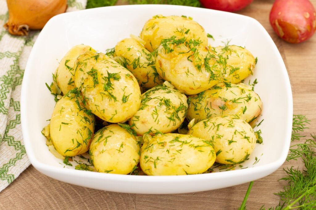 Boiled potatoes garnished with fresh dill