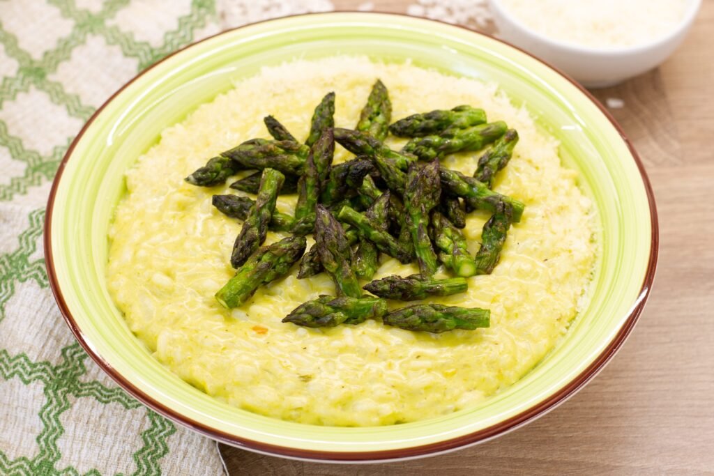 Creamy risotto with green asparagus - a recipe for a classic Italian cuisine