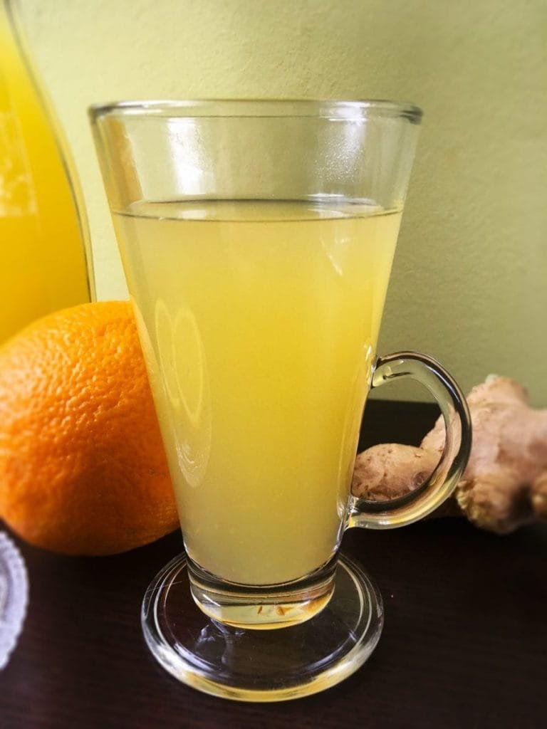 Warm apple drink with orange