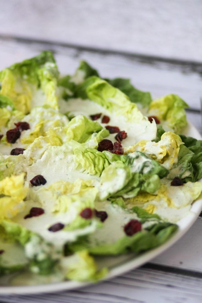 Salad with blue cheese sauce and cranberries