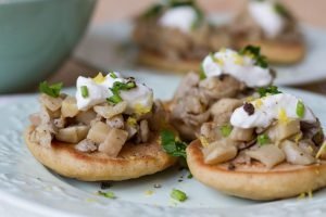 Gluten-free blinis with mushrooms