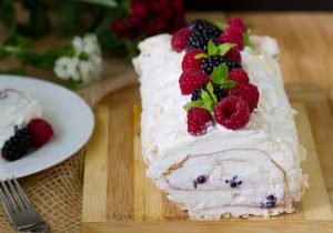 Meringue roulade with whipped cream