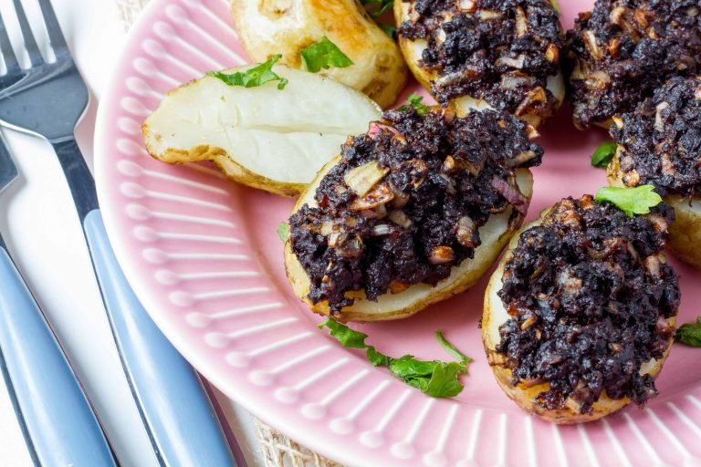 Jerusalem artichokes baked with black pudding