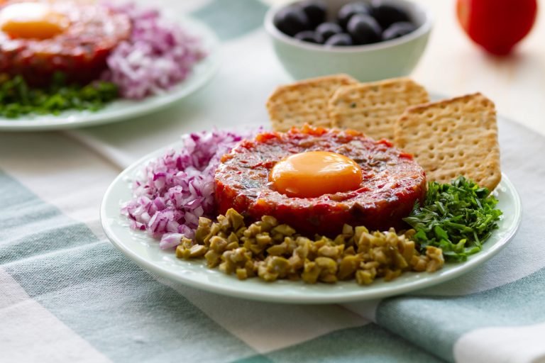 Tartare from tomatoes, peppers and eggplant