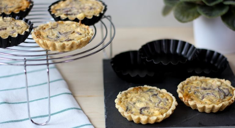 Tarts with cheese and onion