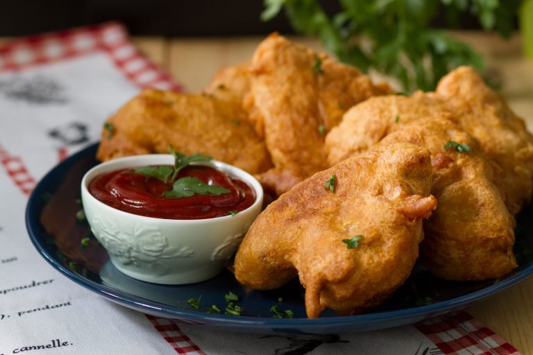 Coated and fried chicken wings
