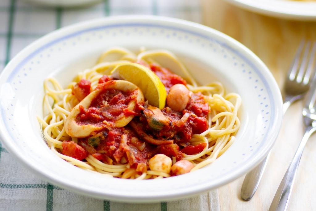 Seafood and pasta with tomato sauce