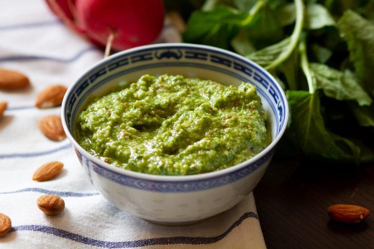 Pesto with almonds and radish greens