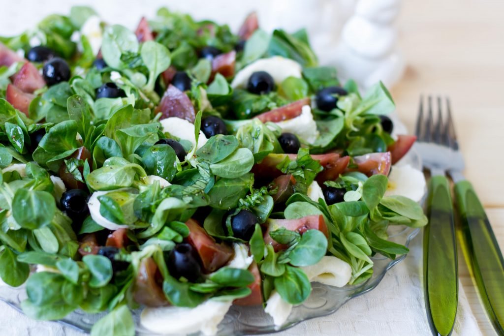 Salad with mozzarella, olives and tomatoes
