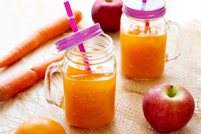 Juice with apple, orange, melon, apricot and carrot
