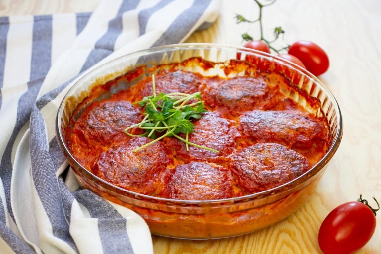 Cabbage cakes with tomato sauce
