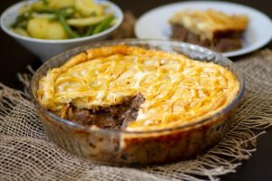 Steak and kidney baked under puff pastry