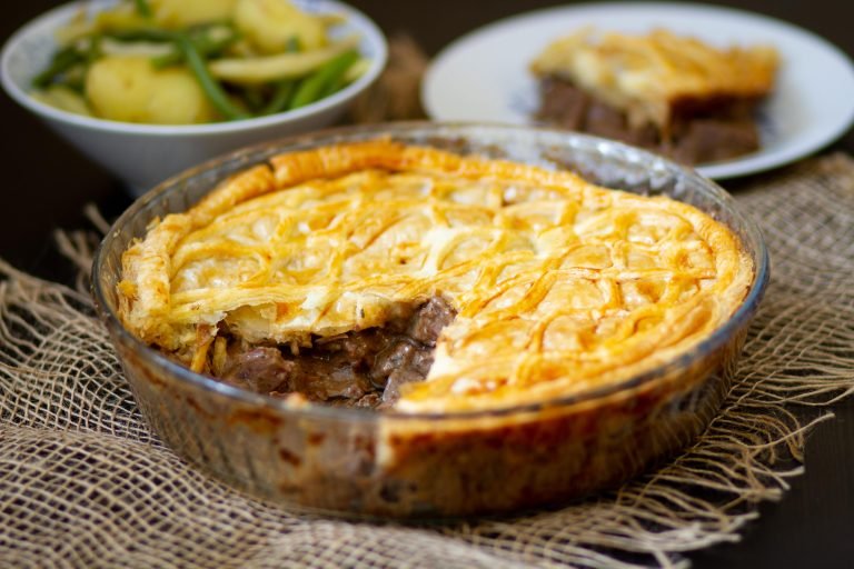 Steak and kidney baked under puff pastry