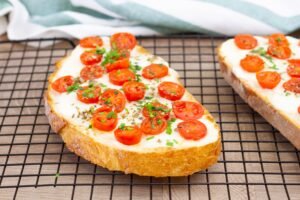 Recipe for baked sandwiches with cheese and tomatoes
