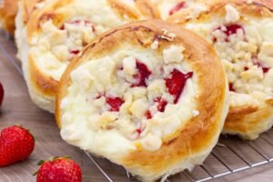 Buns with cheese and strawberries