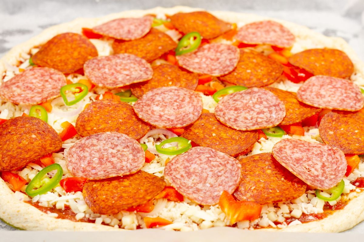 Pizza with pepperoni and salami